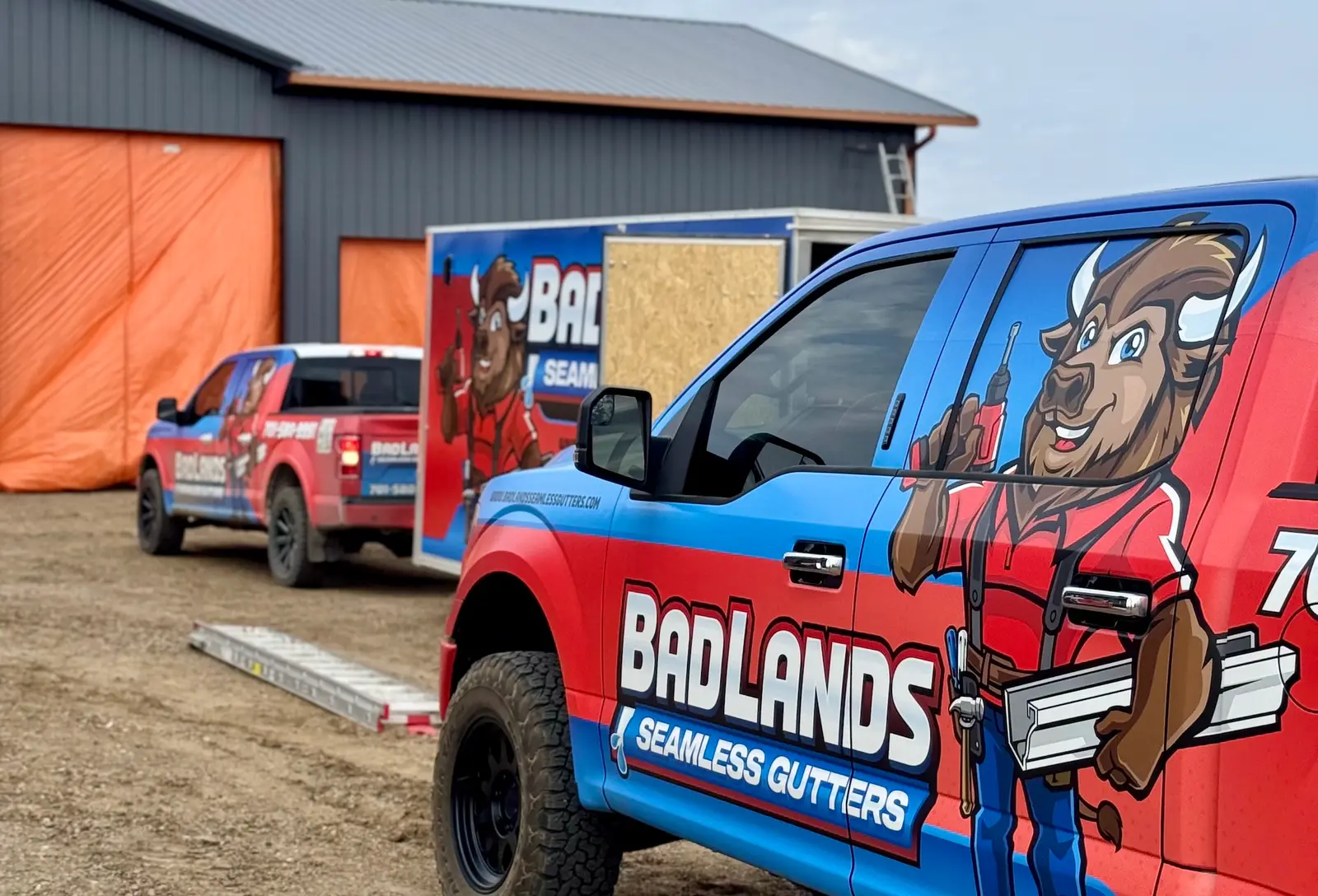 Badlands branded truck and gutter trailer