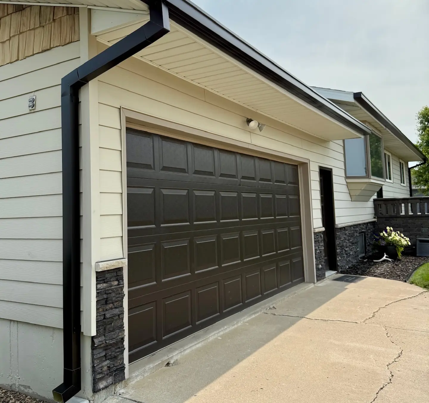 Seamless gutter and downspouts on a Trenton area home